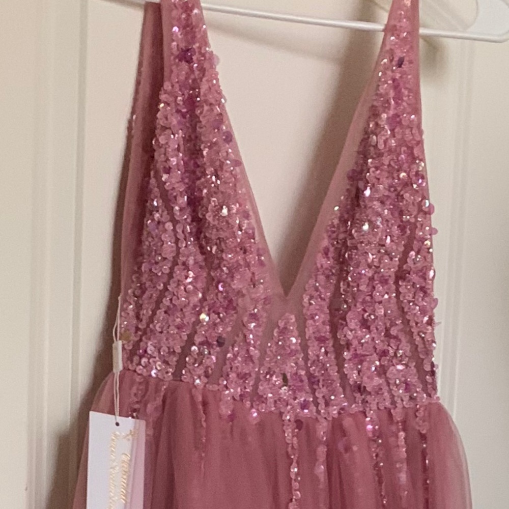 Beautiful Dress coral pink size 0/2 never worn.